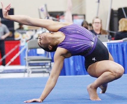 Bartlesville Gymnastics Club's Aiyannah Oliver displays her fluid grace during the recent Level 9 Western Nationals in Salt Lake City, Utah.
