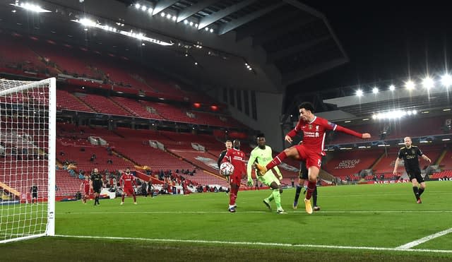 Curtis Jones, right, scores Liverpool's winner