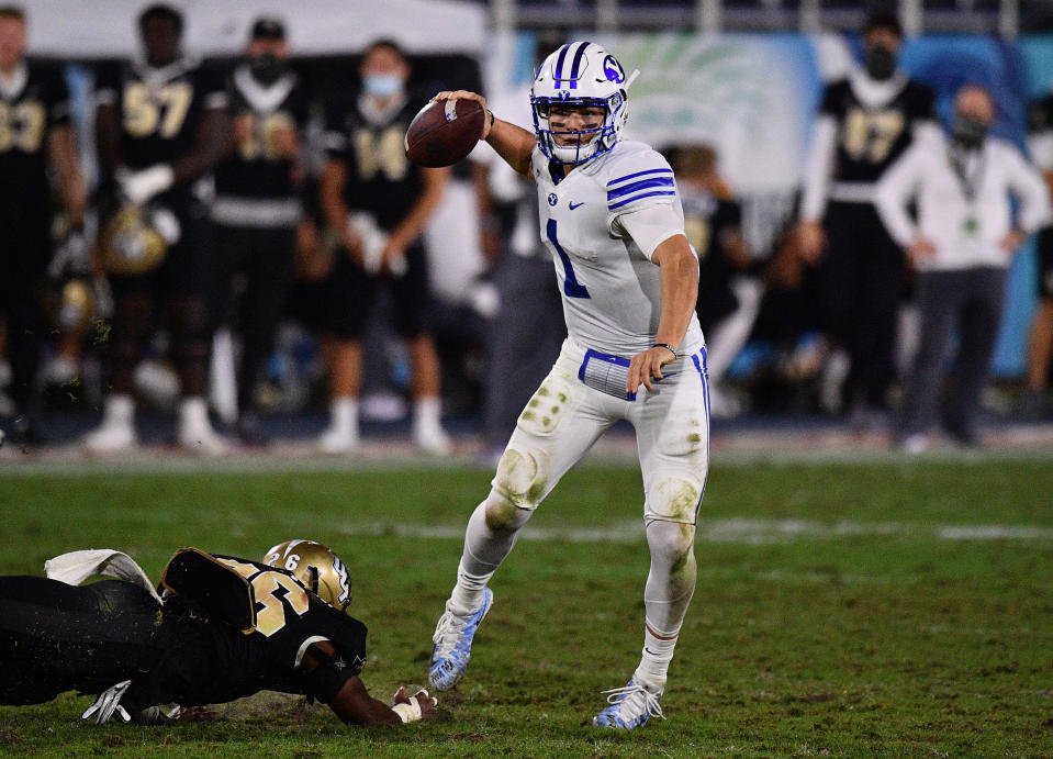 BOCA RATON, FLORIDA - DECEMBER 22: Zach Wilson #1 of the Brigham Young Cougars looks to pass against the Central Florida Knights at FAU Stadium on December 22, 2020 in Boca Raton, Florida. (Photo by Mark Brown/Getty Images)