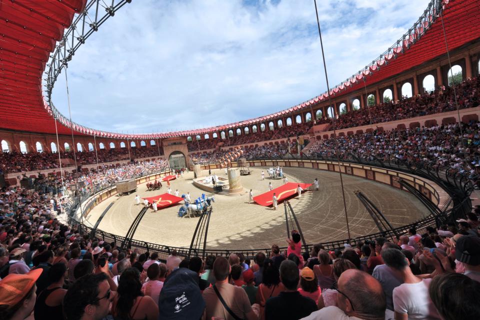 About 7,000 persons attend the circus games in the "Triumph's Sign" live show on August 16, 2013 in the Parc of the Puy du Fou in Les Epesses, western France.