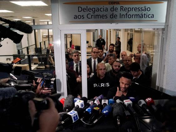 Neymar spoke to journalists afterwards (AP)