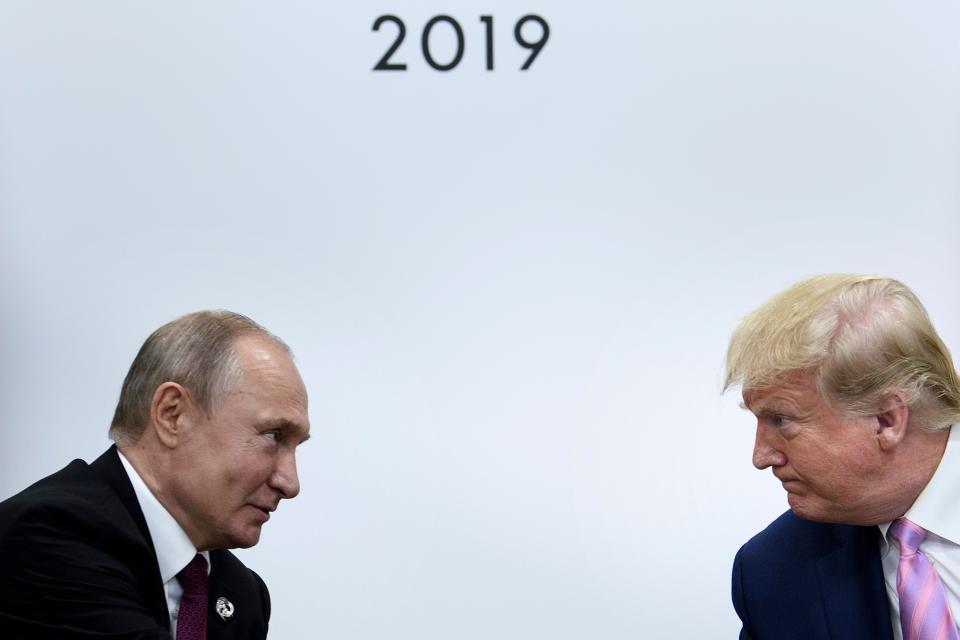 TOPSHOT - US President Donald Trump (R) attends a meeting with Russia's President Vladimir Putin during the G20 summit in Osaka on June 28, 2019. (Photo by Brendan Smialowski / AFP)BRENDAN SMIALOWSKI/AFP/Getty Images ORIG FILE ID: AFP_1HY02G