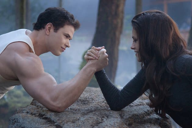 Emmet, left, and Bella arm wrestle in 'The Twilight Saga: Breaking Dawn - Part 2'