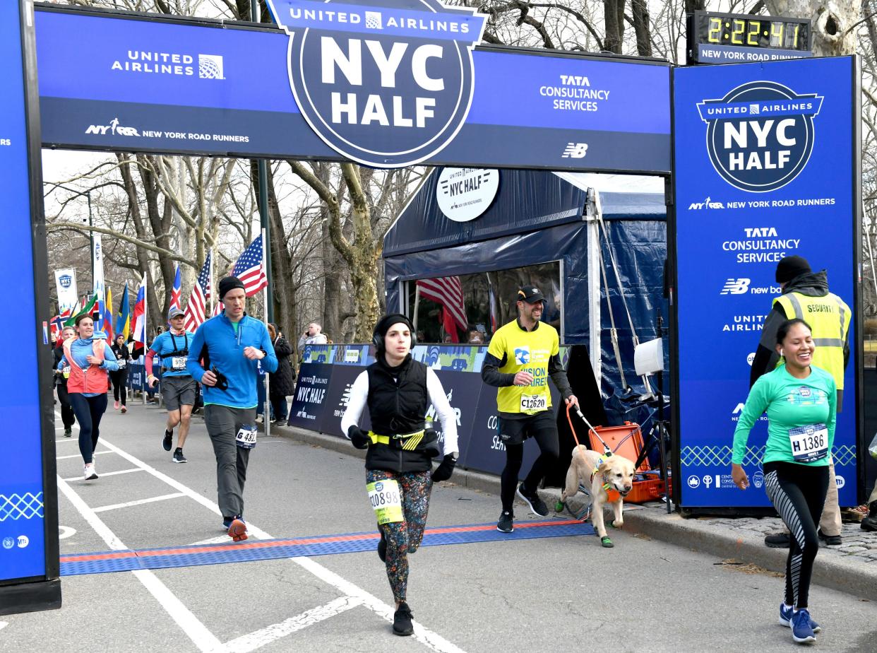 Gus joins Guiding Eyes for the Blind President and CEO, Thomas Panek, as he runs the first ever 2019 United Airlines NYC Half Led Completely by Guide Dogs on March 17, 2019 in New York City. 
