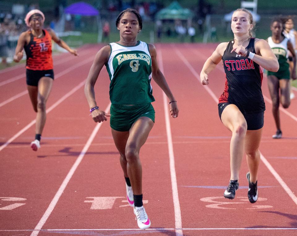 George Jenkins sophomore Geriah Street edges Victory Christian's Addie Lemmond to win the 200 on Tuesday at the Lakeland City Meet. Earlier, Lemmond won the 100.