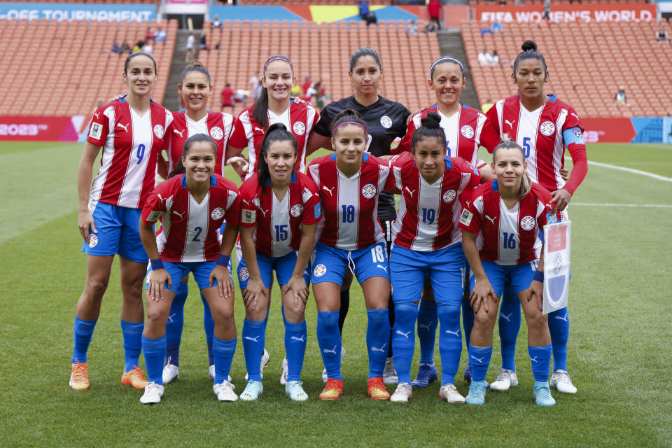 Paraguay pose for a team photo ahead of their FIFA women's World Cup qualifier against Panama in Hamilton, New Zealand, Thursday, Feb. 23, 2023. (Martin Hunter/Photosport via AP)