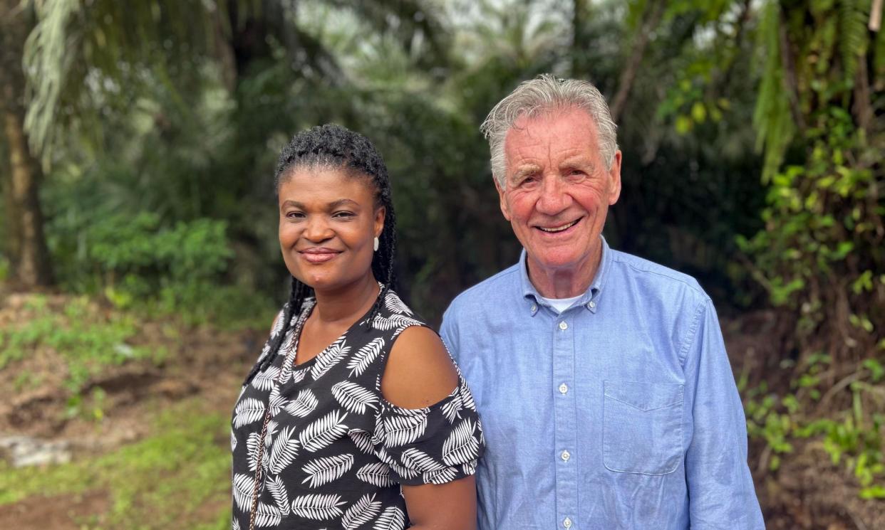 <span>Michael Palin meets Kate Ogbogbo, a palm oil producer.</span><span>Photograph: ITN/Channel 5 Television</span>