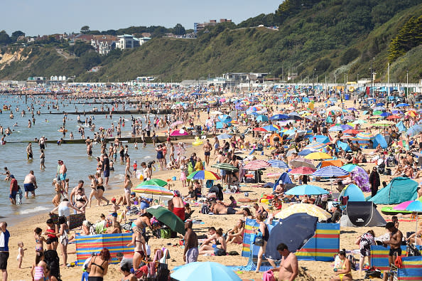 General view of tourists on the beach in Bournemouth, England. 