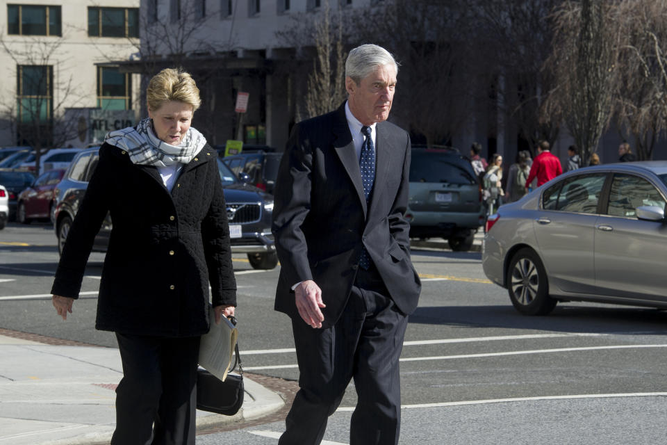 Special Counsel Robert Mueller, and his wife Ann, walk to their car after attending services at St. John's Episcopal Church, across from the White House, in Washington, Sunday, March 24, 2019. Mueller closed his long and contentious Russia investigation with no new charges, ending the probe that has cast a dark shadow over Donald Trump's presidency. (AP Photo/Cliff Owen)