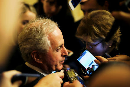 U.S. Senator Bob Corker (R-TN) speaks to reporters as he leaves the Senate floor during votes on the Republican tax plan in Washington November 30, 2017. REUTERS/James Lawler Duggan