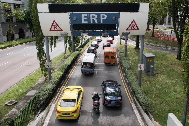 Vehicles passing through an ERP gantry.