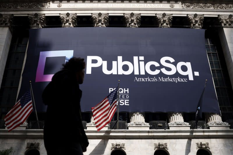 The PublicSq brand logo hangs outside at the New York Stock Exchange before the opening bell Thursday. Photo by John Angelillo/UPI