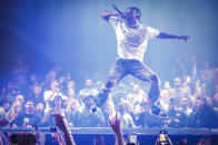 <p>Travis Scott catches some air on Sept. 18 while kicking off his Road to Utopia residency at Zouk Nightclub at Resorts World Las Vegas.</p>