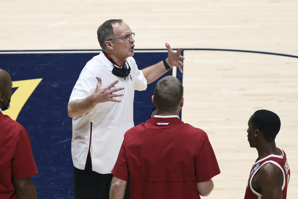 Oklahoma coach Lon Kruger reacts during the second half of an NCAA college basketball game against West Virginia, Saturday, Feb. 13, 2021, in Morgantown, W.Va. (AP Photo/Kathleen Batten)