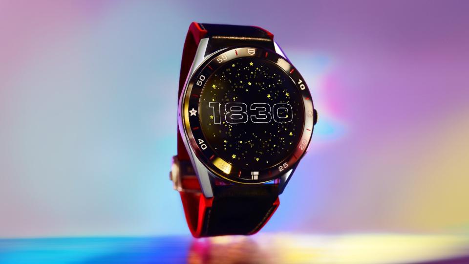 <p>Tag Heuer Connected Limited Edition Super Mario with a red-and-black strap. The watch face features the numbers 1830 in retro font, against a background of stars.</p>
