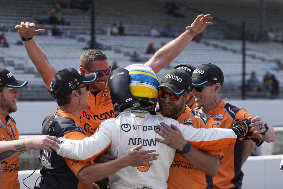 Felix Rosenqvist, of Sweden, celebrates with his crew during qualifications for the Indianapolis 500 auto race at Indianapolis Motor Speedway, Saturday, May 20, 2023, in Indianapolis. (AP Photo/Darron Cummings)