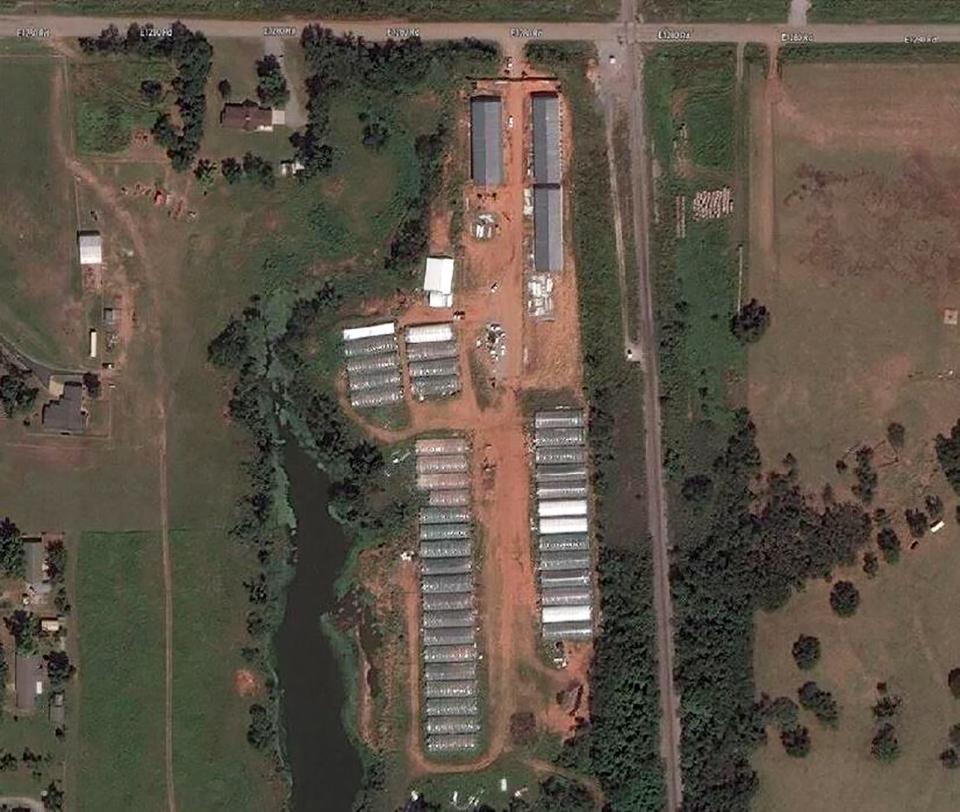 The Oklahoma Bureau of Narcotics led a multi-agency operation Tuesday that included nearly 200 law enforcement officials executing search and arrest warrants at 12 locations across the state. The agency provided aerial photos of some of the properties investigated. Shown is Forest Lake Farm In Amber.