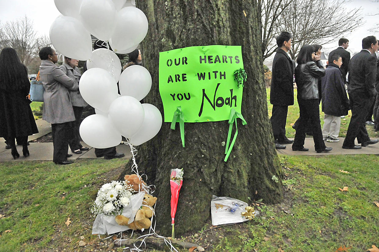 Sign posted at the Abraham L. Green & Son Funeral Home in Fairfield, Connecticut, as folks lined up for the funeral of Noah Pozner (John Woike/Hartford Courant / Tribune News Service via Getty Images)