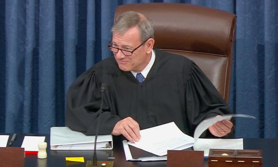 John Roberts, the chief justice of the US supreme court, presides during opening arguments.
