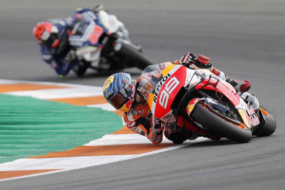 FILE - In this Nov. 17, 2019, file photo, MotoGP rider Jorge Lorenzo of Spain steers his motorcycle during the Valencia Motorcycle Grand Prix at the Ricardo Tormo circuit in Cheste, near Valencia, Spain. MotoGP says it will resume next month with two races in Spain following a suspension caused by the coronavirus pandemic.(AP Photo/Alberto Saiz, File)