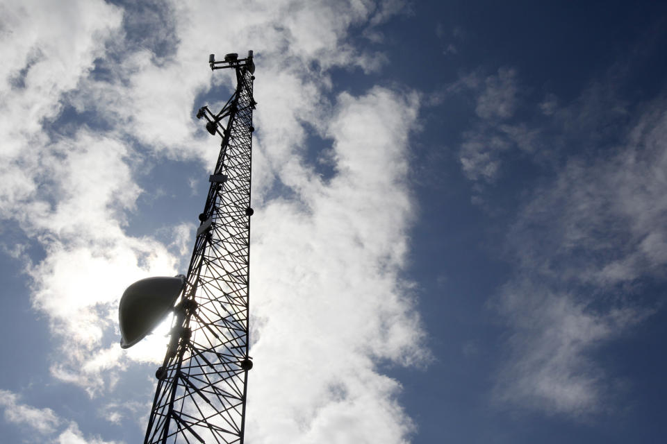 A new broadband tower rises into the sky on Wednesday, June 6, 2012 in Plainfield, Vt. Broadband computer services are now available to 4,000 rural customers in north central Vermont. Gov. Peter Shumlin helped Vermont's Cloud alliance announce that it had added four new towers that will expand service to homes and businesses in Woodbury, Hardwick, Wolcott and parts of Elmore, Greensboro, Walden and Cabot. (AP Photo/Toby Talbot)