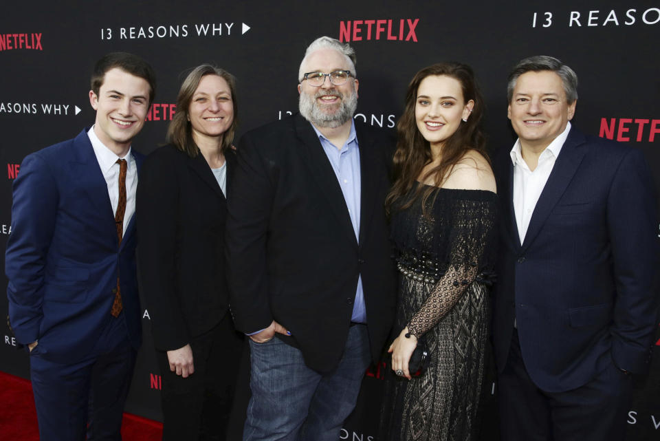 Dylan Minnette, Netflix VP, Original Content Cindy Holland, Exec. Producer Brian Yorkey, Katherine Langford and Netflix Chief Content Officer Ted Sarandos seen at Netflix '13 Reasons Why' Premiere at Paramount Studios on Thursday, March 30, 2017, in Los Angeles, CA. (Photo by Steve Cohn/Invision for Netflix/AP Images)