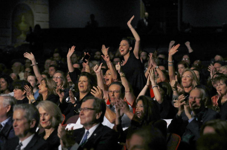 Members of the audience cheer as Republican U.S. Senator Ted Cruz and Democratic U.S. Representative Beto O'Rourke prepare to take part in their first debate for the Texas U.S. Senate in Dallas, Friday, Sept. 21, 2018. (Tom Fox/The Dallas Morning News via AP, Pool)