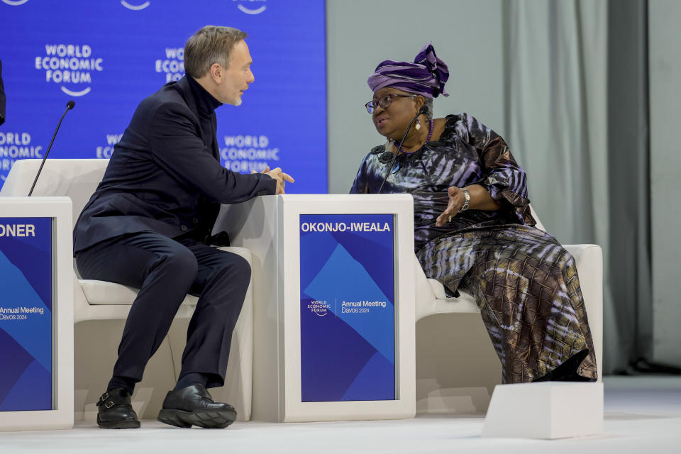 Nigerian-American economist Ngozi Okonjo-Iweala speaks with German finance minister Christian Lindner, right, in the panel "The Global Economic Outlook" on the last day of the forum's Annual Meeting in Davos, Switzerland, Friday, Jan. 19, 2024. (AP Photo/Markus Schreiber)