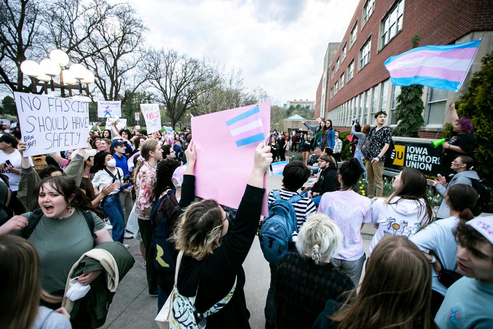 Transgender-rights protesters rally outside as Matt Walsh speaks at an event hosted by the Young America's Foundation, Wednesday, April 19, 2023, at Hubbard Park on the University of Iowa campus in Iowa City, Iowa.