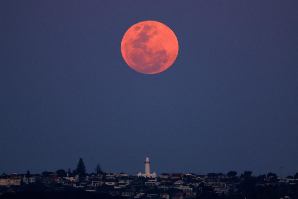 A harvest supermoon over the Macquarie Lighthouse in Sydney