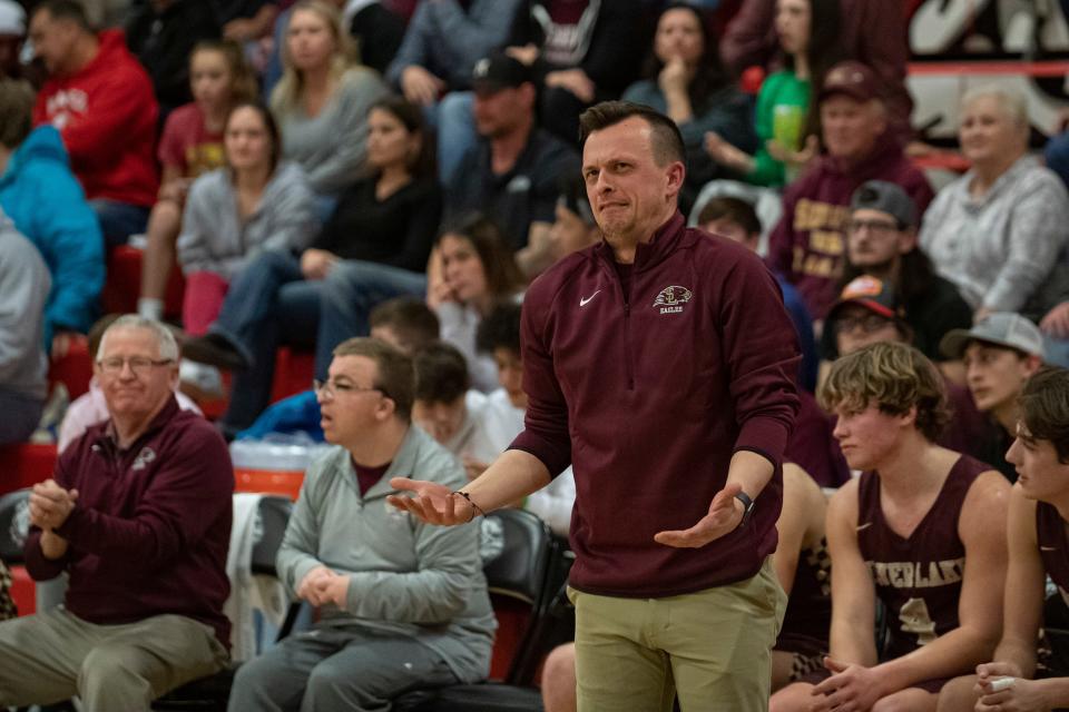 Silver Lake head coach Johnny Roberts reacts to an officials call Friday Feb. 11, 2022, at Rossville High School in Rossville, Kan.