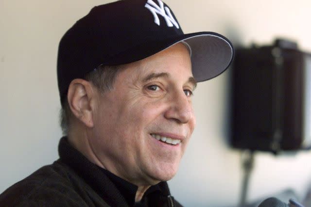 Linda Cataffo/NY Daily News Archive via Getty Images Paul Simon in the New York Yankees' dugout