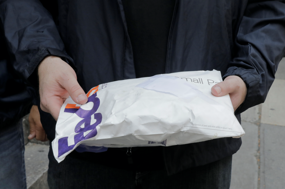 A package that had been intercepted containing fentanyl is held by a U.S. Immigration and Customs Enforcement's Homeland Security Investigations officer (HSI) in New York City., August 8, 2018. (Photo: REUTERS/Lucas Jackson)