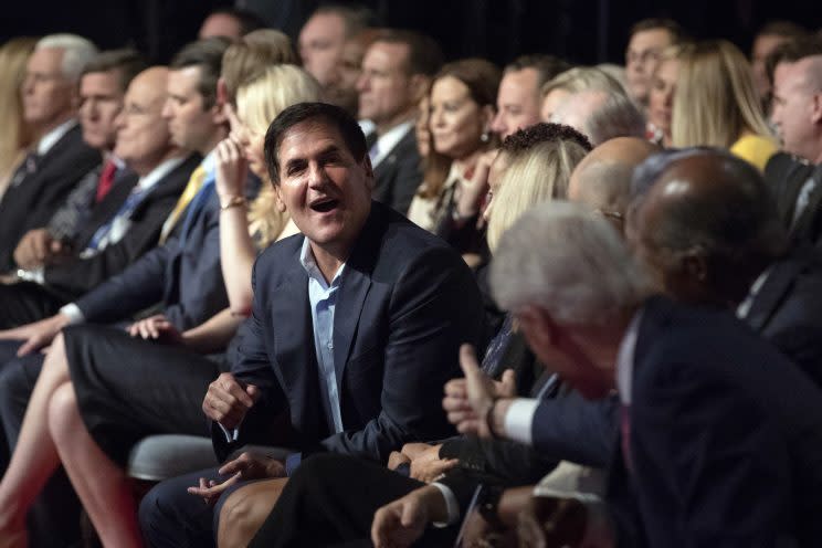 Mark Cuban chats with Bill Clinton at a presidential debate this fall. (AP)