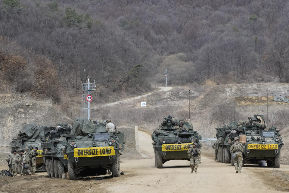 U.S. Army's armored vehicles move at a training field in Paju, South Korea, near the border with North Korea, Friday, March 17, 2023. North Korea said Friday it fired an intercontinental ballistic missile to "strike fear into the enemies" as South Korea and Japan agreed at a summit to work closely on regional security with the United States and staged military exercises around the region.(AP Photo/Ahn Young-joon)