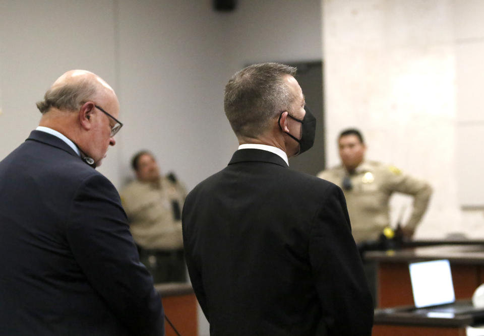 Paul Flores, right, listens during his trial in Monterey County Superior Court on Tuesday, Oct. 18, 2022, in Salinas, Calif. Jurors unanimously found Flores guilty of first-degree murder of Cal Poly student Kristin Smart. (Laura Dickinson/The Tribune via AP, Pool)