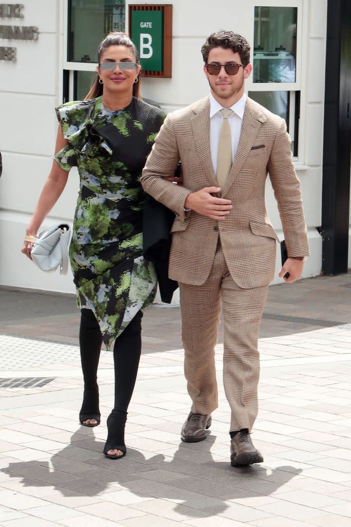 Priyanka Chopra Jonas and Nick Jonas attend day thirteen of the Wimbledon Tennis Championships at All England Lawn Tennis and Croquet Club on July 15, 2023 in London, England.