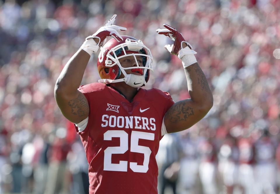 Joe Mixon settled in the civil lawsuit with the woman he punched in 2014. (AP)