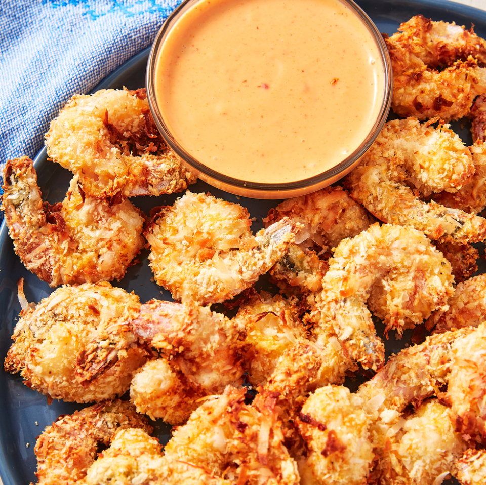 <p>They get totally crispy, and the spicy mayo goes perfectly with the sweet coconut. Match made in heaven! </p><p>Get the <a href="https://www.delish.com/uk/cooking/recipes/a34913363/air-fryer-shrimp-recipe/" rel="nofollow noopener" target="_blank" data-ylk="slk:Air Fryer Coconut Prawns;elm:context_link;itc:0;sec:content-canvas" class="link ">Air Fryer Coconut Prawns</a> recipe. </p>