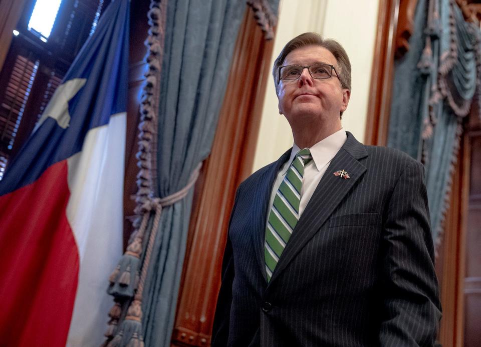 Texas Lt. Gov. Dan Patrick exits a press conference at the state Capitol about the state's response to the coronavirus on Tuesday, March 31, 2020, in Austin, Texas.