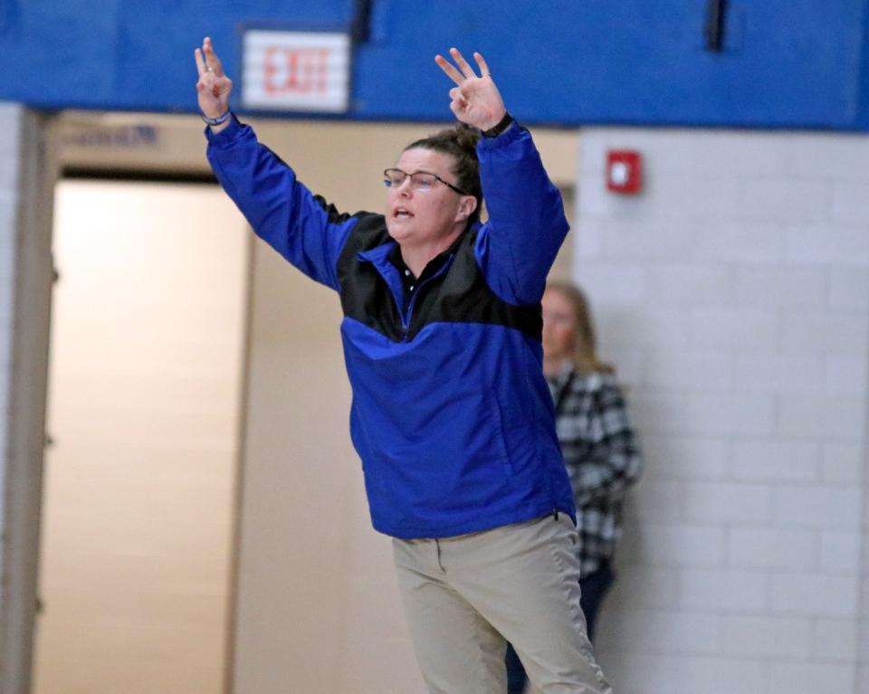 Bethany Christian girls basketball head coach Krysten Parson calls out a play to her team in the first half of Saturday's Class 1A semi-state semifinal game against Washington Township at Frankfort High School.