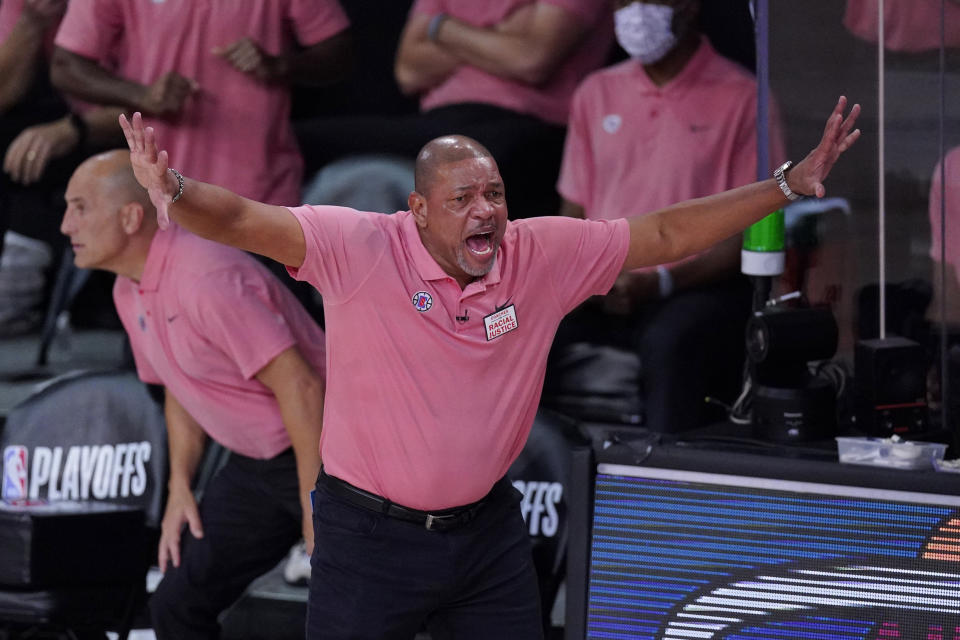 Los Angeles Clippers head coach Doc Rivers during the first half of an NBA conference semifinal playoff basketball game against the Denver Nuggets,Tuesday, Sept. 15, 2020, in Lake Buena Vista, Fla. (AP Photo/Mark J. Terrill)