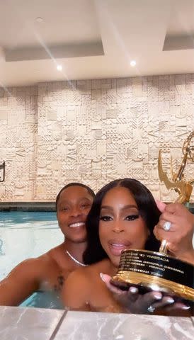 <p>Niecy Nash/Instagram</p> Jessica Betts (left) and Niecy Nash-Betts take a dip in the pool after the 2024 Emmy Awards