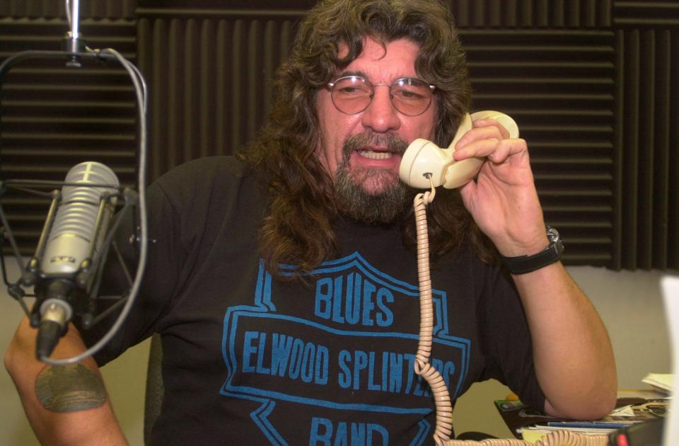 Harvey Stauffer takes a call during his "Blues Revue" program on WVPE-FM (88.1). "I've tried to make it a community show," he said in November 2003. "I've tried to open the airwaves so that people could express what they feel, too. If I have it, I'll play it."