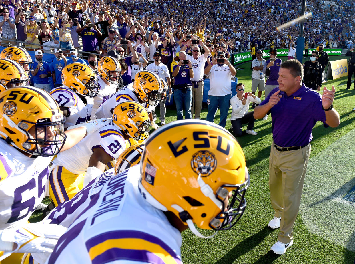 PASADENA, CA - SEPTEMBER 04: LSU head football coach Ed Orgeron leads his team on to the field against UCLA at the Rose Bowl in Pasadena on Saturday, Sept. 4, 2021. The UCLA Bruins host the LSU Tigers in a NCAA college football game at the Rose Bowl in Pasadena. (Photo by Will Lester/MediaNews Group/Inland Valley Daily Bulletin via Getty Images)