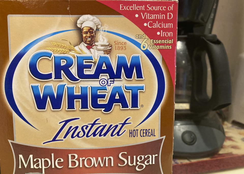 A box of Cream of Wheat is displayed on a counter, Thursday, June 18, 2020 in White Plains, N.Y. Cream of Wheat and Mrs. Butterworth are the latest brands reckoning with racially charged logos. B&G Foods Inc., which makes Cream of Wheat hot cereal, said it is initiating “an immediate review” of its packaging. A smiling black chef holding a bowl of cereal has appeared on Cream of Wheat packaging and in ads since at least 1918, according to the company's web site. (AP Photo/Donald King)