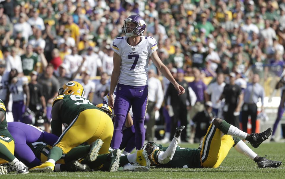 Minnesota Vikings kicker Daniel Carlson reacts after missing a field goal in the final sends of overtime an NFL football game against the Green Bay Packers Sunday, Sept. 16, 2018, in Green Bay, Wis. The game ended in a 29-29 tie. (AP Photo/Morry Gash)