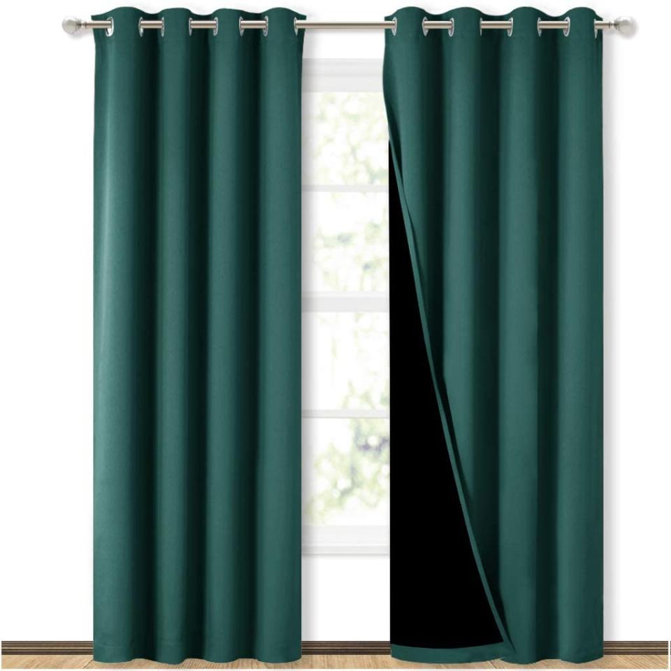 Green total-blackout drapes (Photo: Amazon)