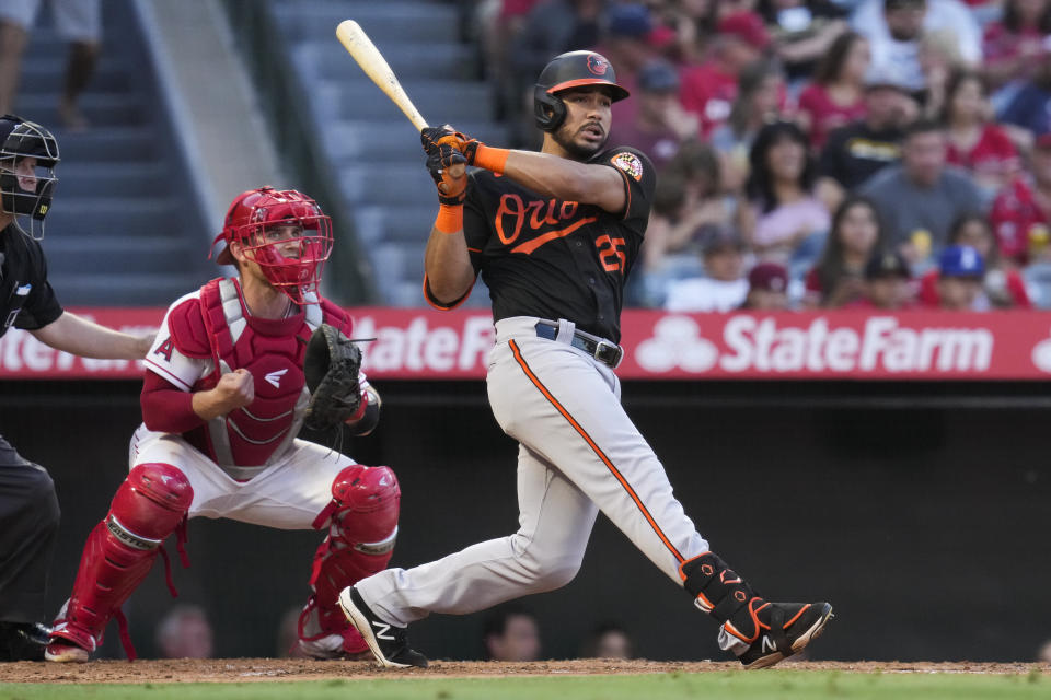 Baltimore Orioles' Anthony Santander (25) doubles during the third inning of a baseball game against the Los Angeles Angels Friday, July 2, 2021, in Anaheim. Austin Hays, Trey Mancini and Ryan Mountcastle scored. (AP Photo/Ashley Landis)