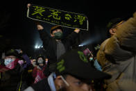 A supporter of the Democratic Progressive Party holds up a sign which reads "Do not piss Taiwan off" at a rally in southern Taiwan's Tainan city on Friday, Jan. 12, 2024 ahead of the presidential election on Saturday. (AP Photo/Ng Han Guan)